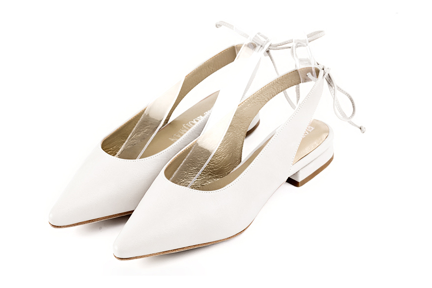 Women's off white slingback dress shoes. Pointed toe. Flat flare heels - Front view
